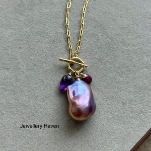 Deep purplish iridescent baroque pearl toggle necklace