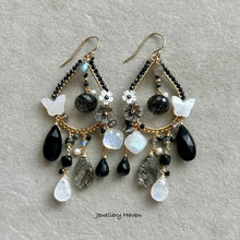 Load image into Gallery viewer, Black spinel, moonstone, snowflake obsidian chandelier earrings