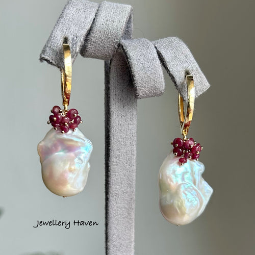 Pinkish iridescence white baroque pearl and ruby earrings